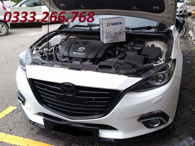 xe Mazda 2 thay ắc quy tại nhà